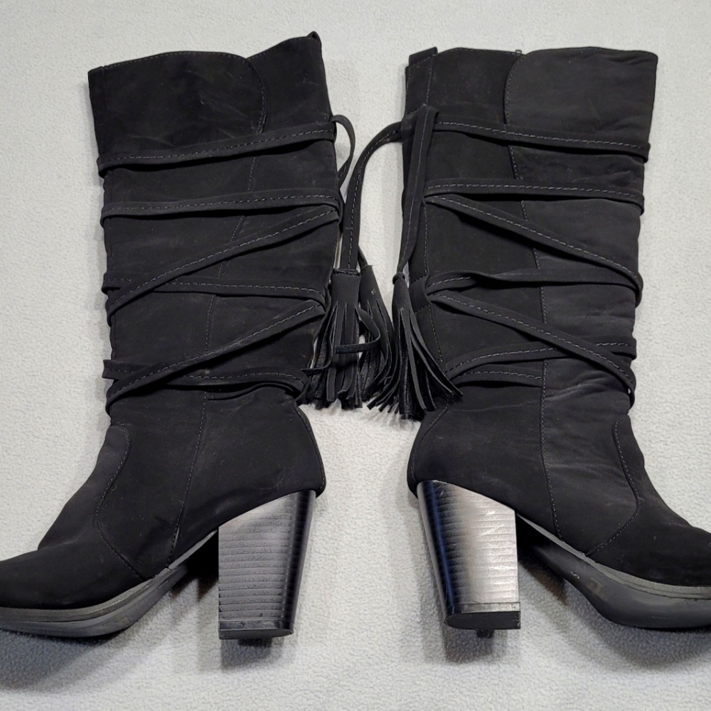 Knee high heeled boots